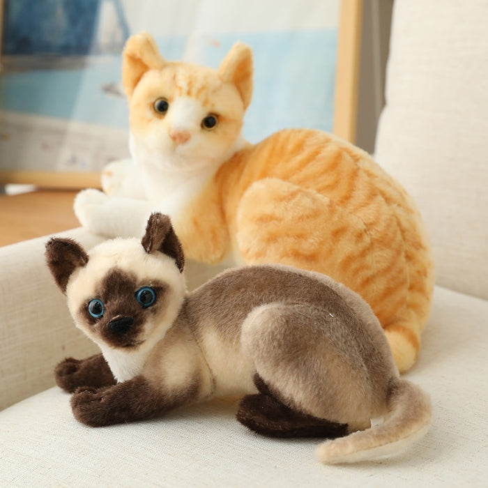 Experience the joy of cuddling up with a lifelike Siamese cat plush toy from My Best Buy