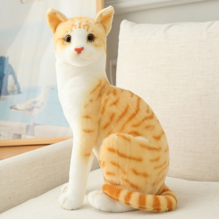 Experience the joy of cuddling up with a lifelike Siamese cat plush toy from My Best Buy
